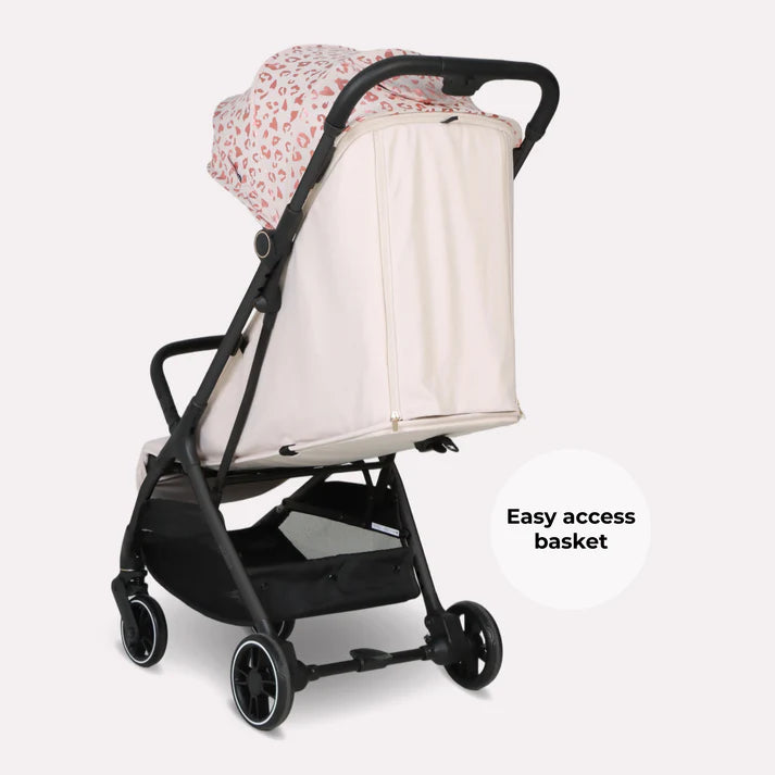 My babiie mbx6 auto-fold compact stroller with black frame cream canopy pink heart pattern and matching storage basket