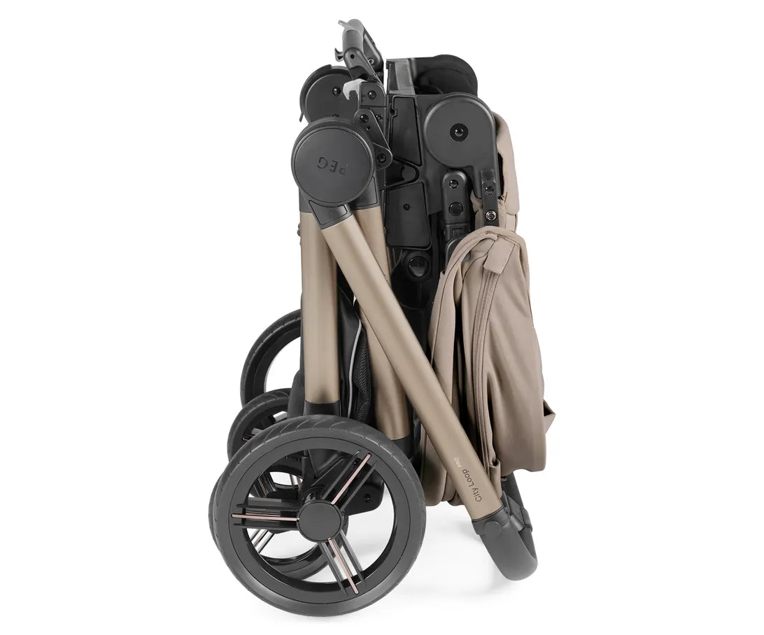 Peg perego city loop pro stroller in pine bark color with beige fabric canopy and taupe metallic foldable frame