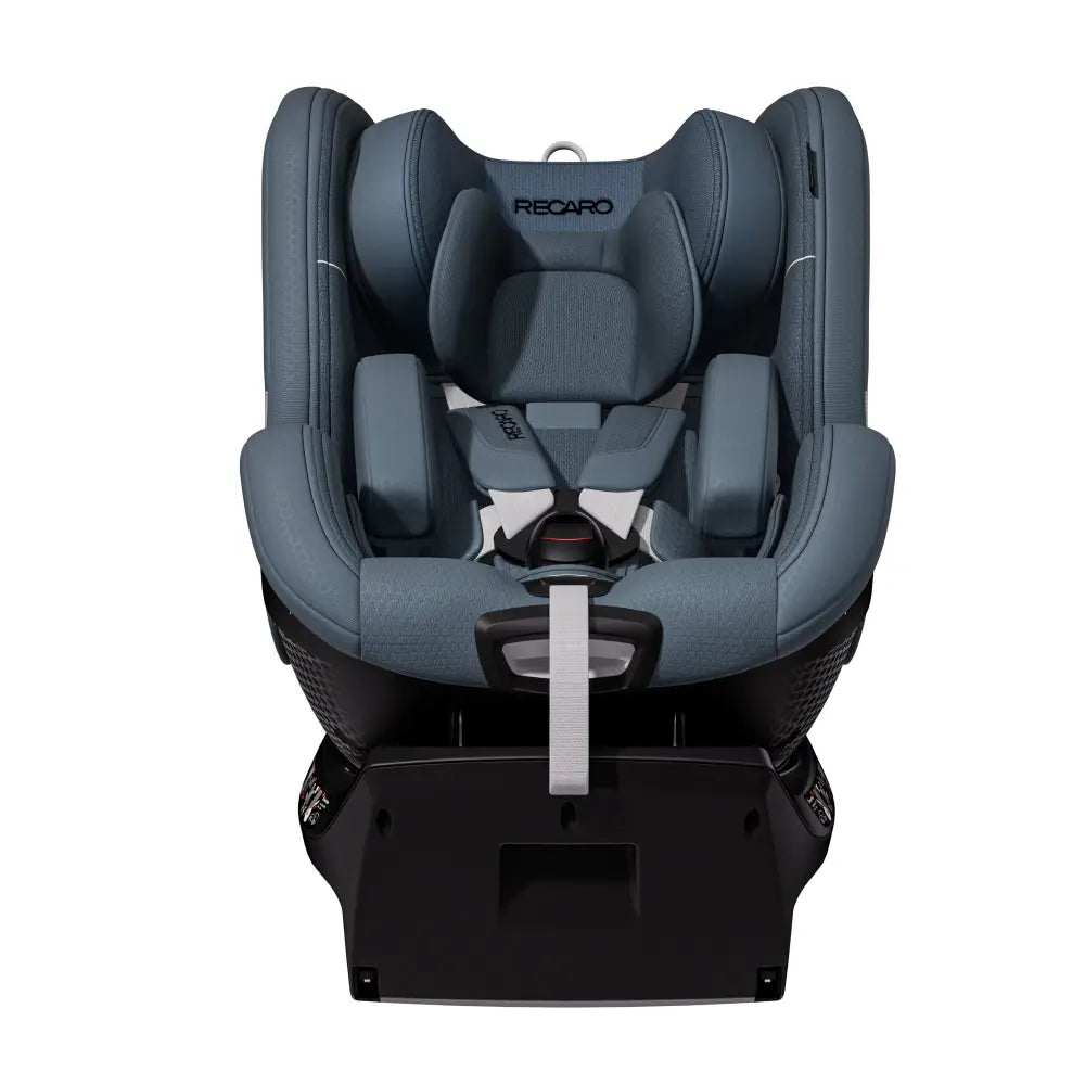 Recaro TORON 1 in Gallant Grey, front view with padded insert, shoulder harness, buckle and grey adjustment strap.