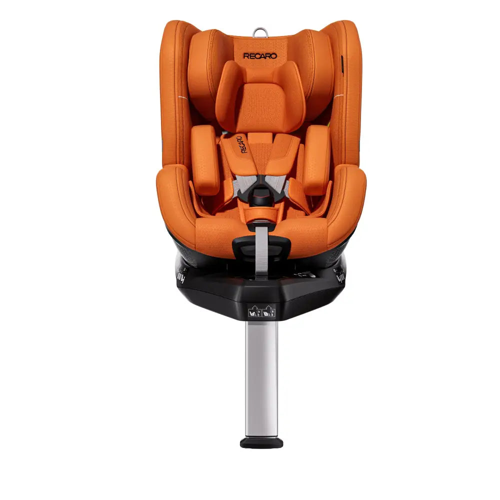 Recaro TORON 1 in Vibrant Orange, front view with padded insert, harness and extended silver support leg.