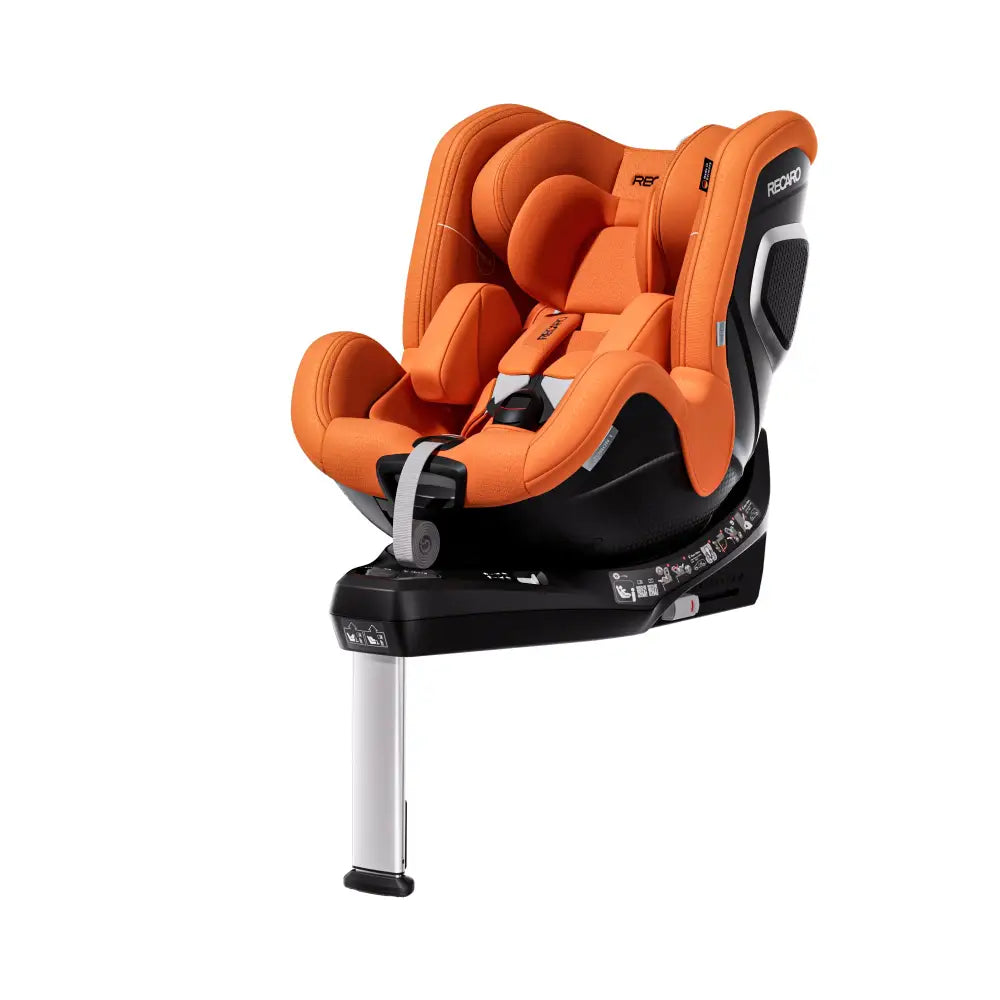 Vibrant Orange TORON 1, angled front view with padded insert, harness, silver-trimmed shell and support leg.