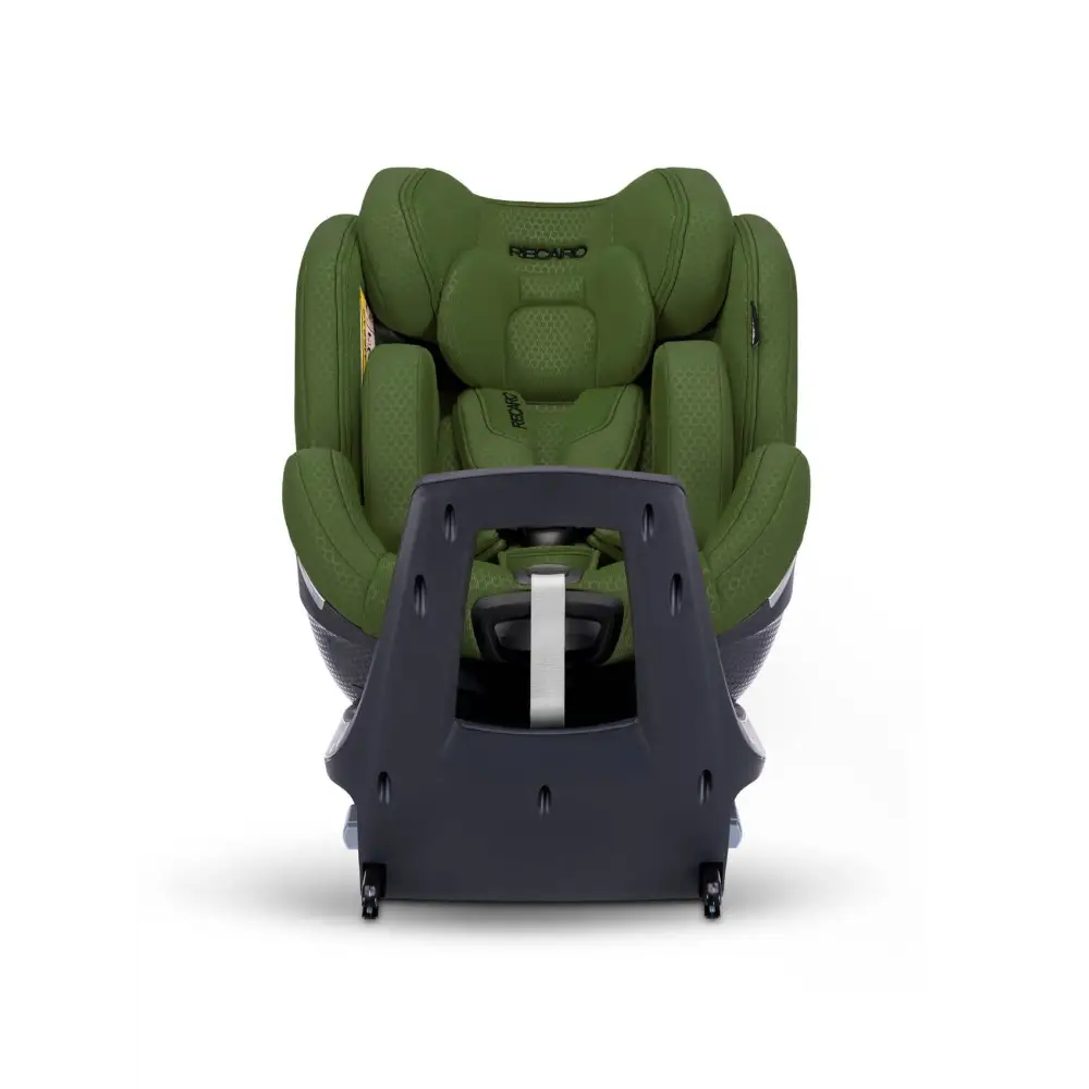 Epic Green XENON 1 with padded insert and harness, viewed across the tall black panel at the end of its base.