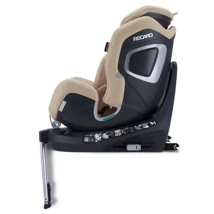 Elegant Beige XENON 1 KID, upright side view showing silver-trimmed shell, black base and extended support leg.
