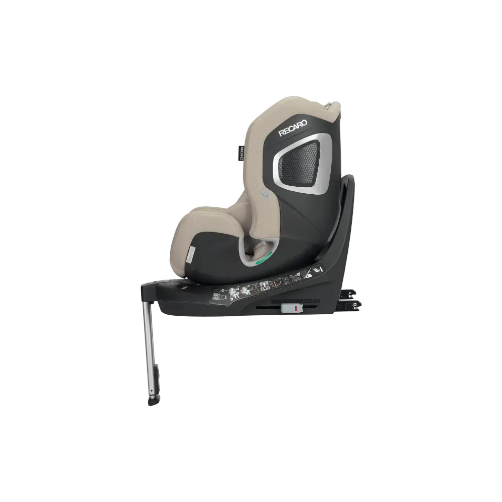 Elegant Beige XENON 1 KID, angled front view with padded harness, black base and extended silver support leg.