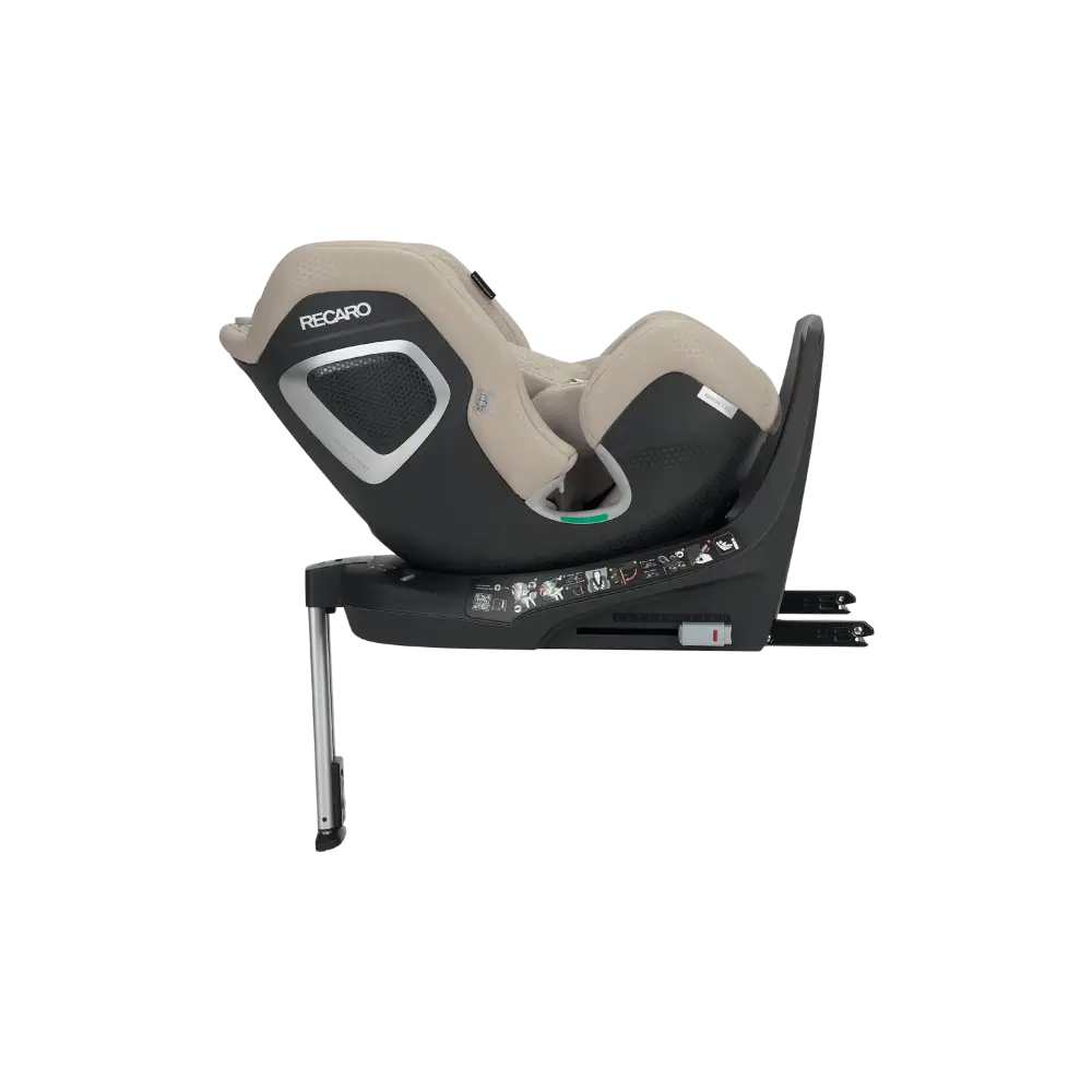 Elegant Beige XENON 1 KID, reclined side view showing silver-trimmed shell and extended support leg.