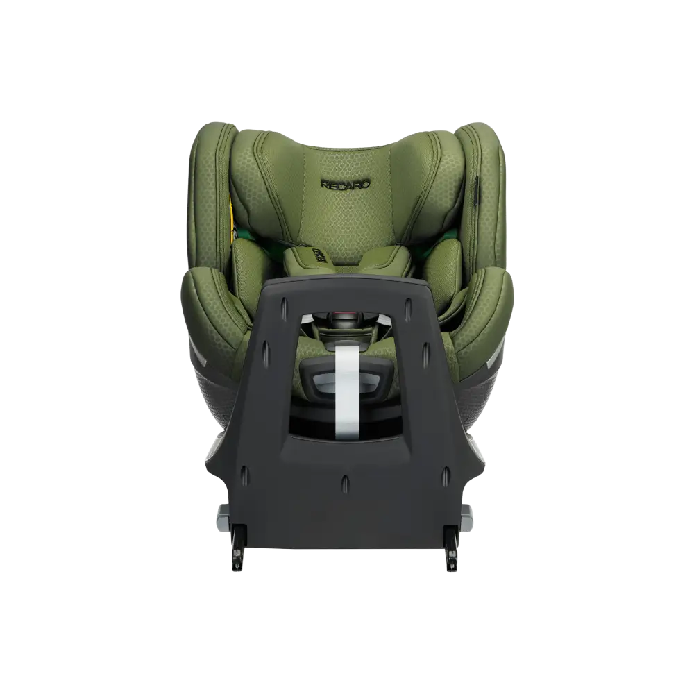 Epic Green XENON 1 KID with padded harness, viewed across the tall black panel at the end of its base.
