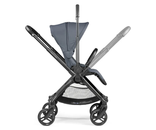 Modern gray stroller with sleek black frame and adjustable handlebars featured in switch it up the stroller every parent is talking about