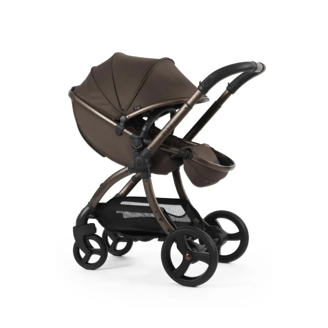 Egg3 chocolate velvet stroller in brown and black with metallic frame soft fabric canopy and multi-wheel design