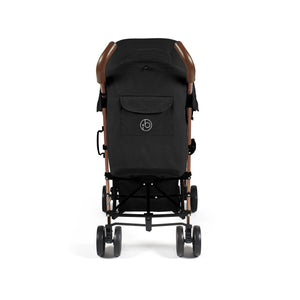 Back side of ickle bubba discovery stroller in black with rose gold accents and logo on the back pocket