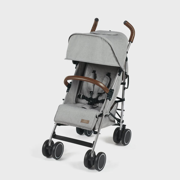 Ickle Bubba Discovery stroller in grey with brown leather handles and black wheels shown from the back side
