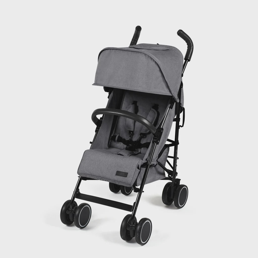 Ickle Bubba Discovery stroller in graphite grey with gray fabric and black metal frame featuring four wheels and compact design