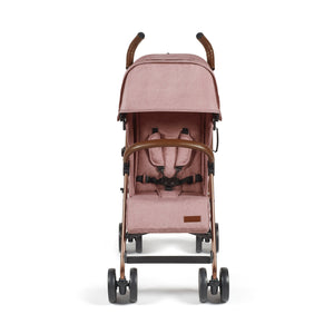 Ickle Bubba Discovery stroller in dusky pink with rose gold frame soft pink fabric canopy and brown leather handles