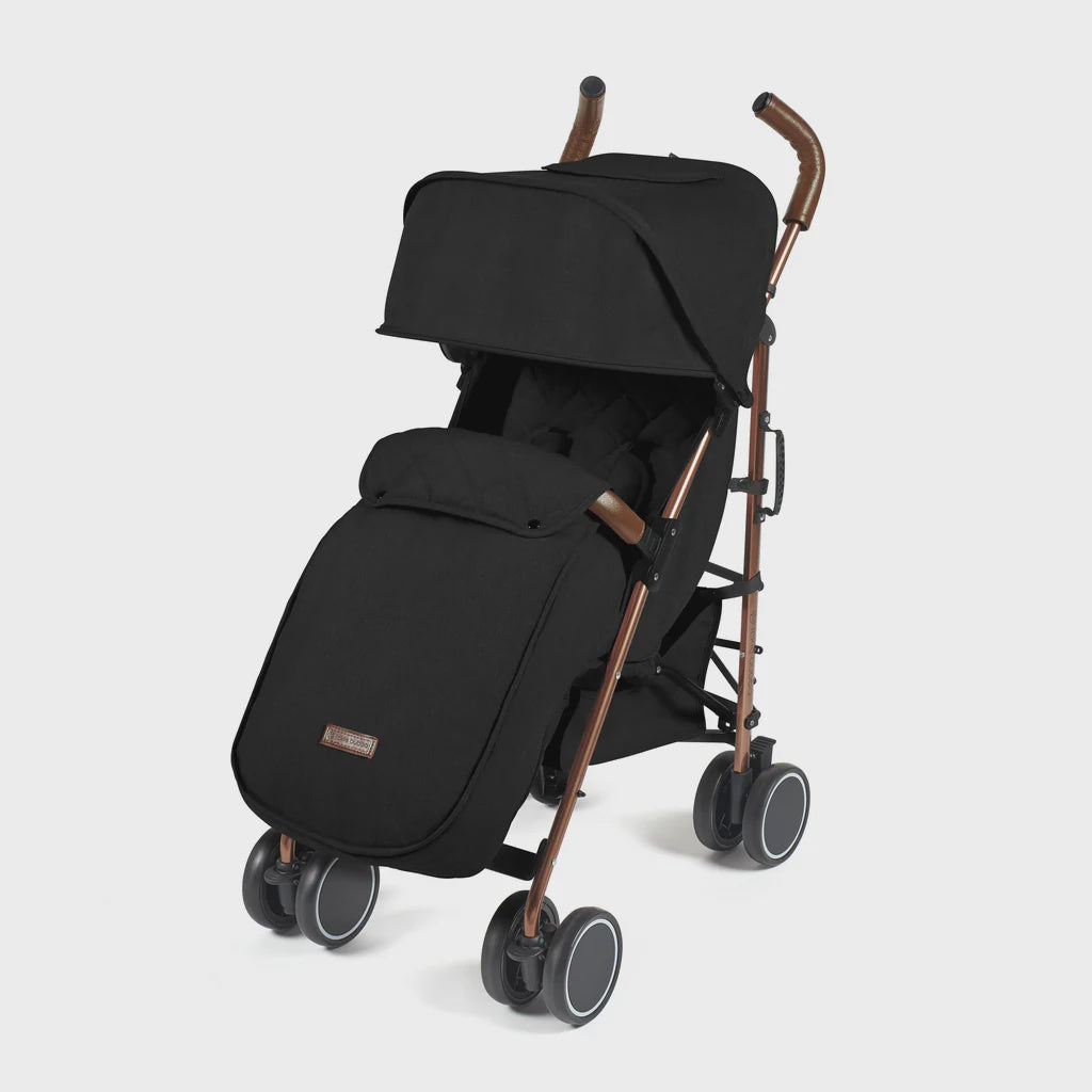 Ickle bubba discovery MAX stroller in black with rose gold metal frame and wooden handle grips shown from the back side