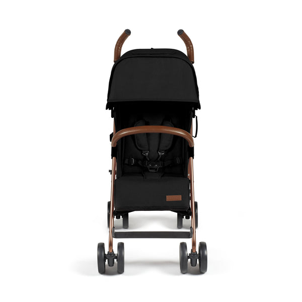Black Ickle Bubba Discovery MAX stroller with rose gold metal frame and brown leather handles shown from the back side