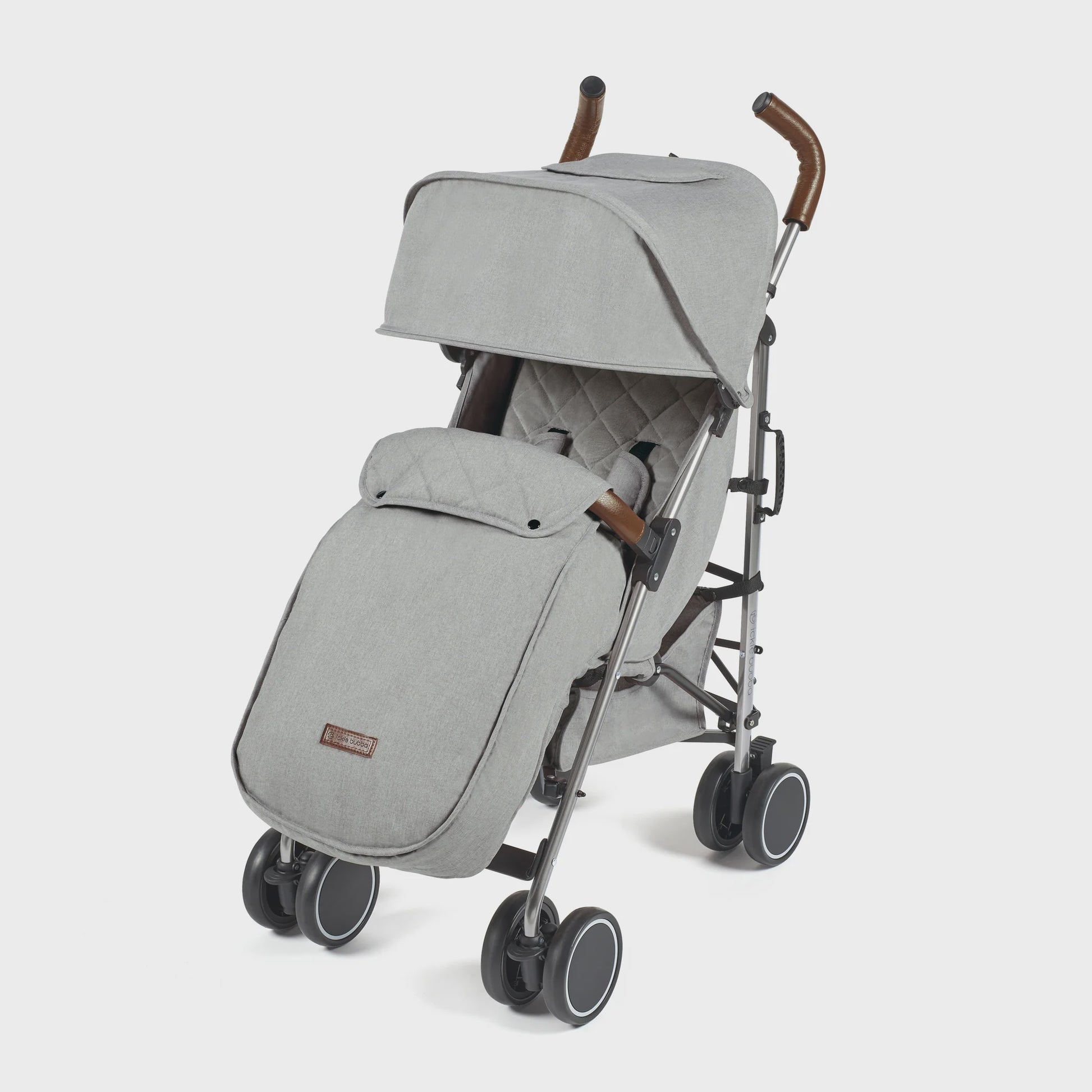 Gray fabric ickle bubba discovery max stroller with wooden handle grips and black wheels shown from the back side