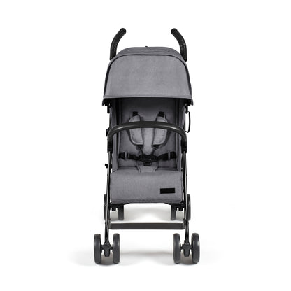Gray fabric ickle bubba discovery max stroller with black metal frame handlebars shown from the back side