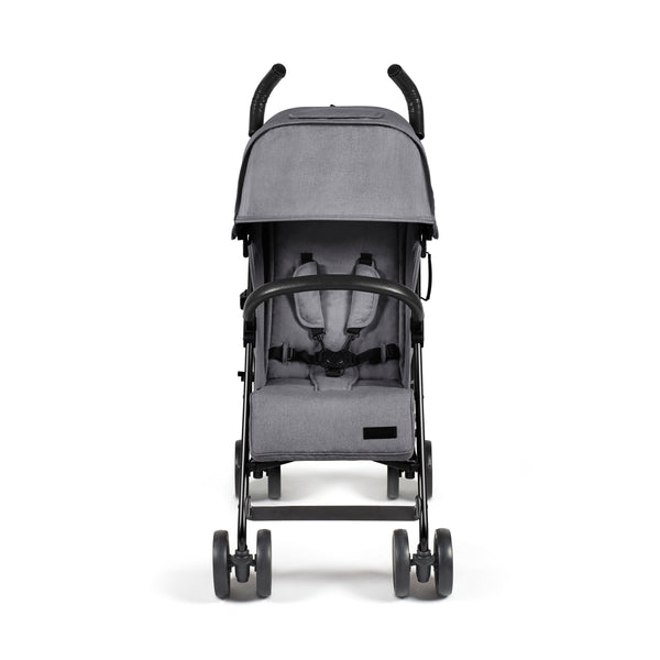 Gray fabric ickle bubba discovery max stroller with black metal frame handlebars shown from the back side