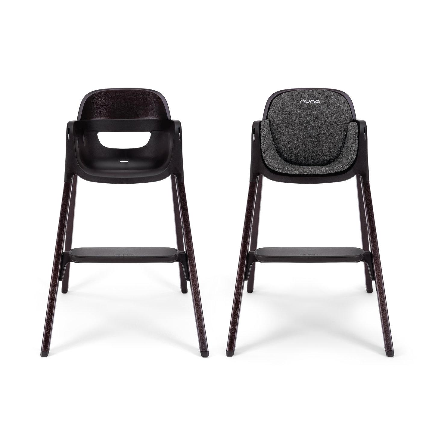 Nuna BRYN highchair metro with black textured fabric seat and dark wooden legs for modern dining seating