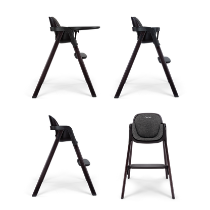 Modern black nuna BRYN highchair with sleek wooden legs and textured gray fabric seat for stylish feeding
