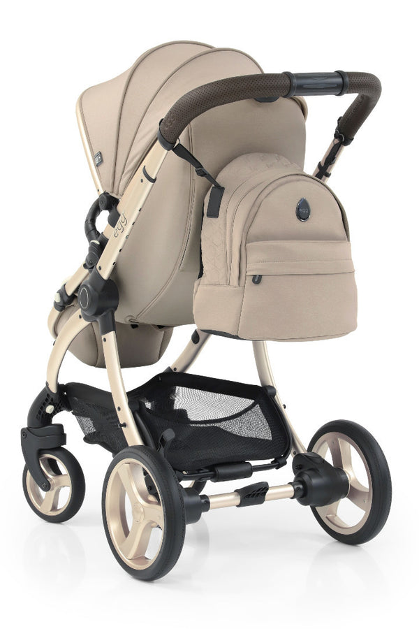 Beige and black egg3 feather stroller with matching backpack attached to handlebar in all stages 360 bundle