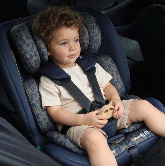 My Babiie MBCS80 foldable i-Size Isofix toddler booster seat in navy blue leopard print with padded headrest and adjustable harness straps