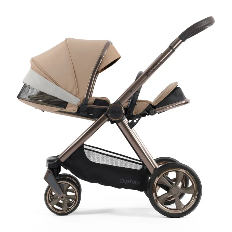 Beige and black oyster 4 fawn essentials stroller with metallic bronze frame and mesh storage basket