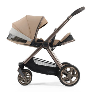 Beige and black oyster 4 fawn essentials stroller with metallic bronze frame and mesh storage basket