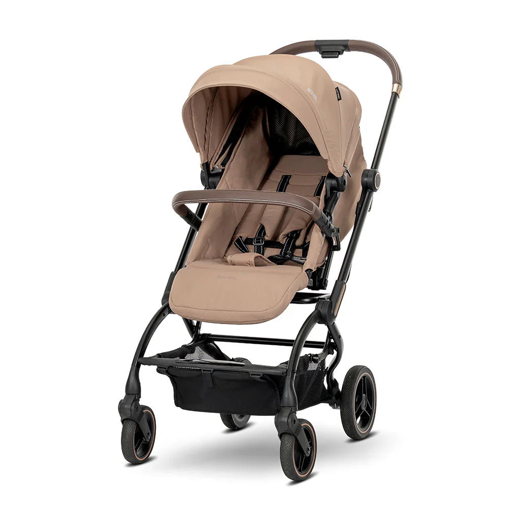 Beige and black lorelli makaya 360 rotation stroller with fabric upholstery and metallic handle accents for newborns to 22kg