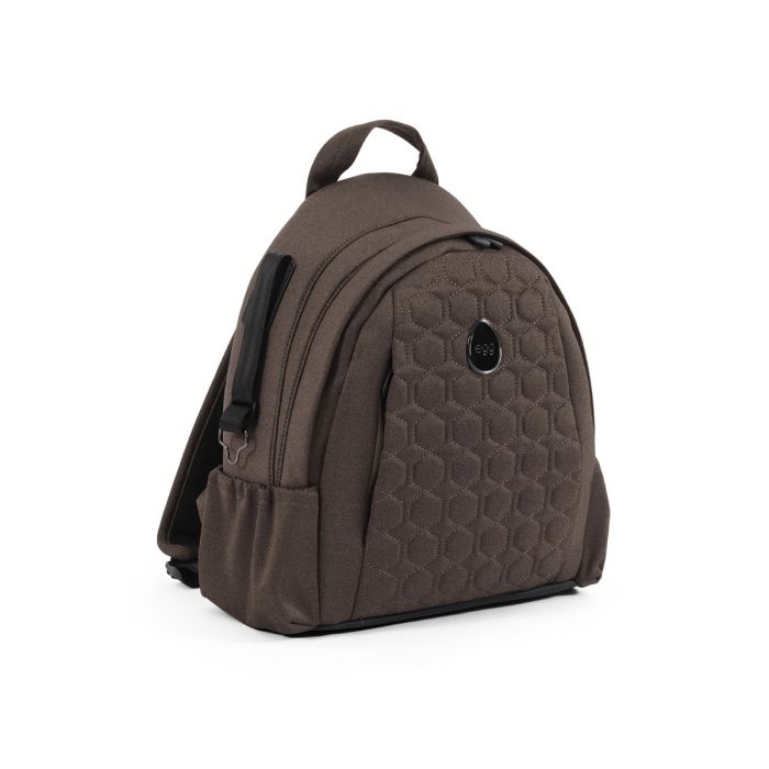 Brown quilted backpack with hexagonal pattern and black accents shown from the back in egg3 chocolate velvet 360 bundle