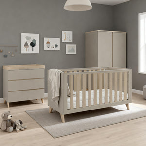 Beige wooden crib with slatted sides and tapered legs from Babymore Dante 3 Piece nursery room set cashmere