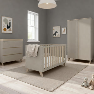 Beige wooden babymore dante crib with vertical slats and tapered legs in cashmere nursery room set