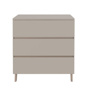 Modern taupe three-drawer dresser with minimalist design and slender legs from babymore dante nursery set cashmere