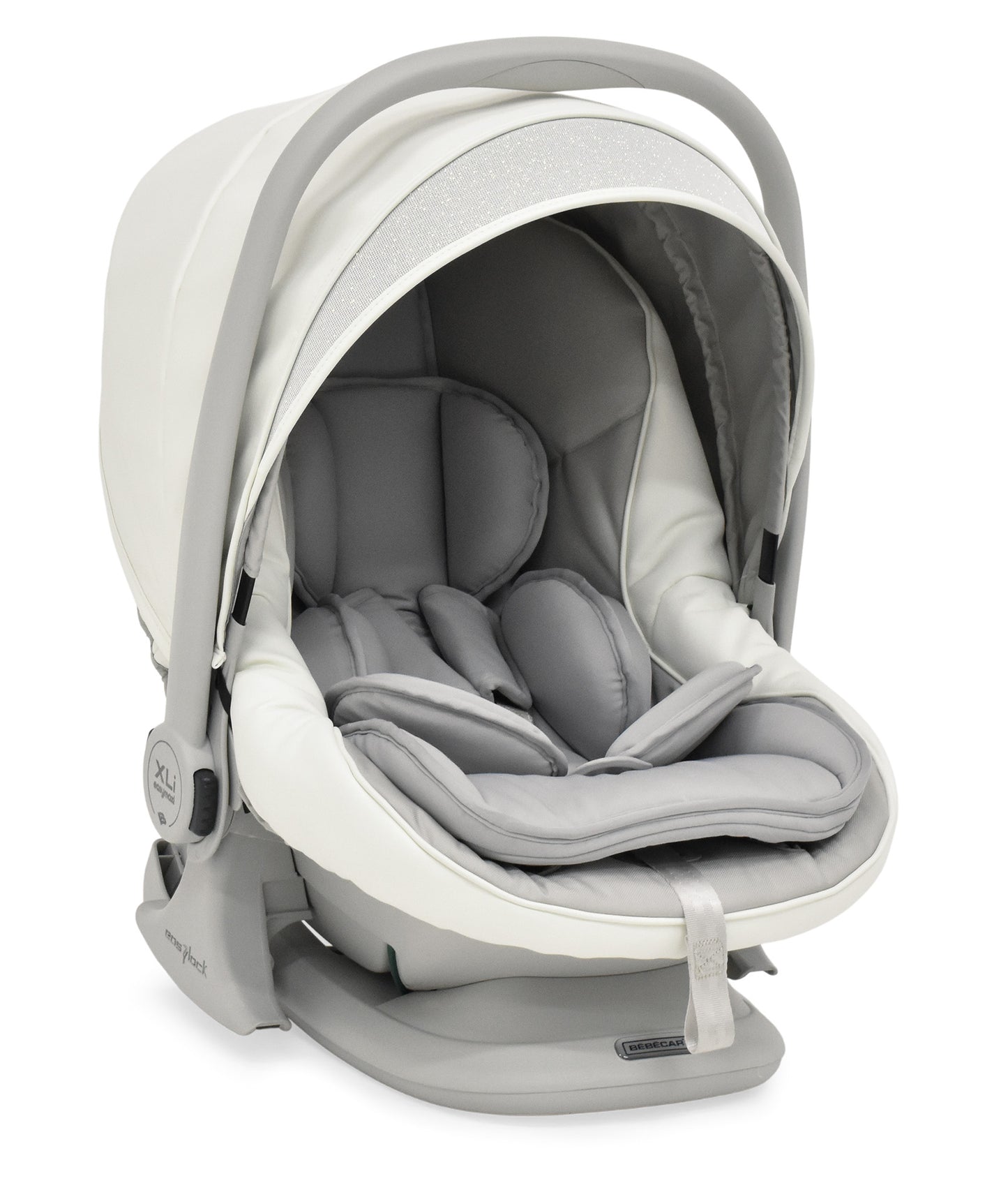 A sleek modern bebécar stylo class privé white sparkle 3-in-1 travel system infant car seat in beige and gray with plush cushioning
