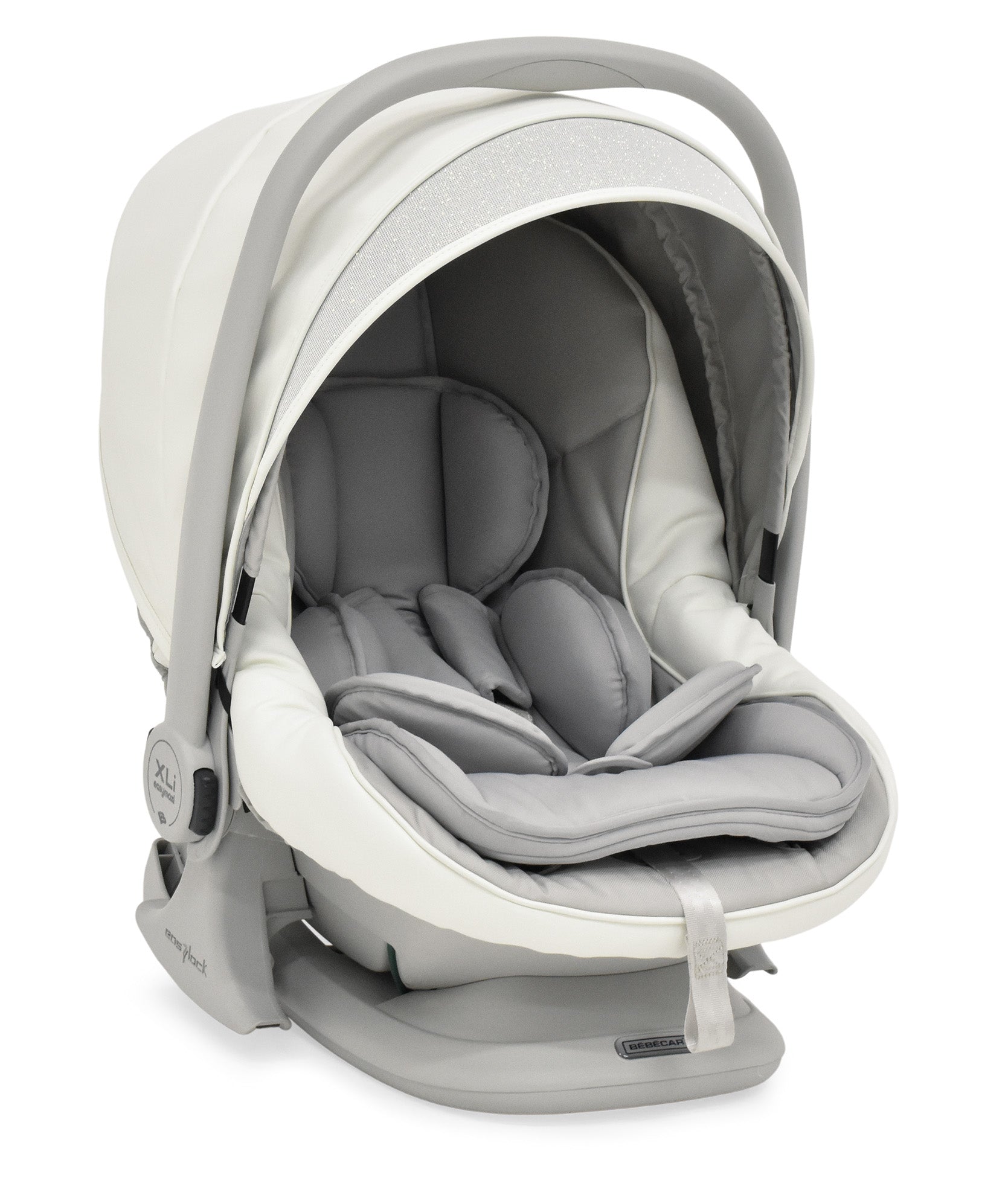 A sleek modern bebécar stylo class privé white sparkle 3-in-1 travel system infant car seat in beige and gray with plush cushioning