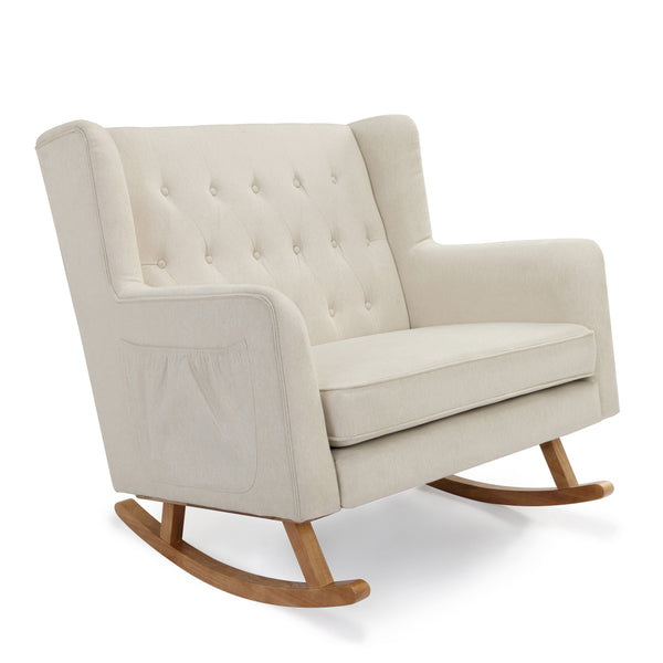Cream-colored upholstered Babymore Lux Snuggle rocking chair with tufted back and wooden rockers in ivory