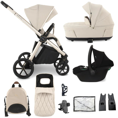 Beige and black my babiie mb450 luxe 3-in-1 travel system with stroller, bassinet, car seat, backpack, and accessories