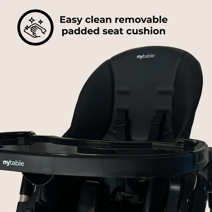 Black padded seat cushion with sleek modern design and mybabie logo for my babiie MBHC9 luxe highchair in black and rose gold