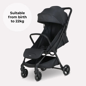 My Babiie MBX2 compact stroller in black with a sleek modern design and four wheels for lightweight mobility