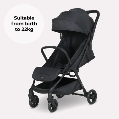 My Babiie MBX2 compact stroller in black with a sleek modern design and four wheels for lightweight mobility