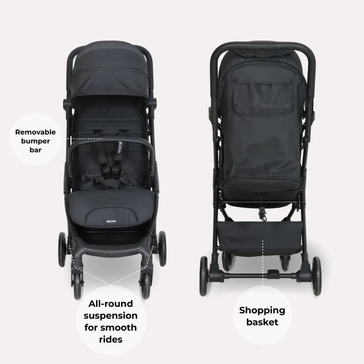 Black fabric my babiie mbx2 compact stroller with metal frame removable bumper bar and shopping basket visible from back side