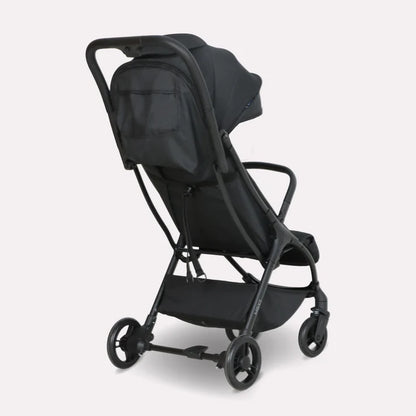 My Babiie MBX2 compact stroller in black with a sleek metal frame and soft fabric seat for easy mobility