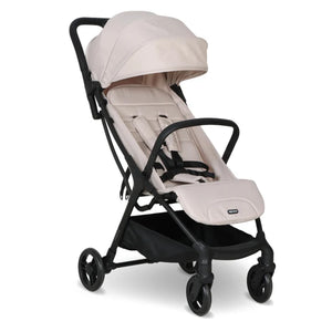 My babiie mbx2 compact stroller oatmeal in beige and black with foldable canopy padded seat and four wheels