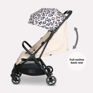 My babiie mbx6 auto fold compact stroller with black and white leopard print canopy beige fabric seat and black frame