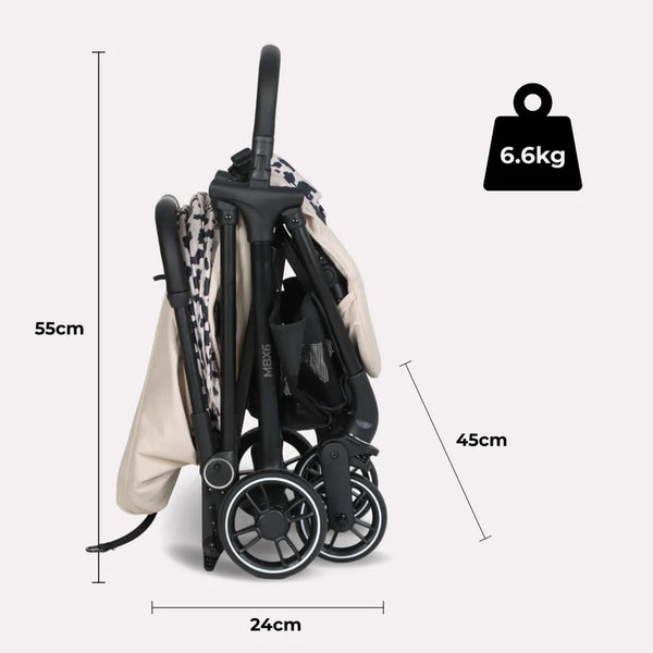 My Babiie MBX6 auto-fold compact stroller in black and beige with patterned fawn leopard canopy and four wheels