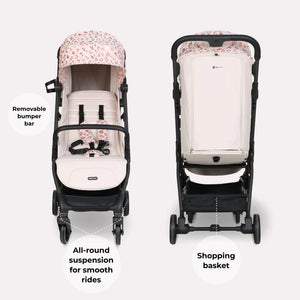 My babiie mbx6 auto-fold compact stroller in black and cream with floral canopy and adjustable handlebar