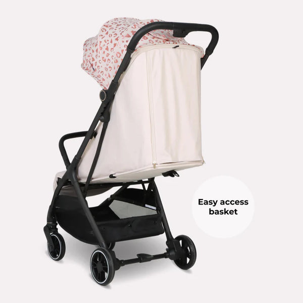 My babiie mbx6 auto-fold compact stroller with black frame cream canopy pink heart pattern and matching storage basket
