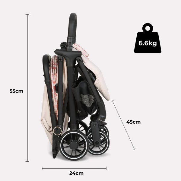 My Babiie MBX6 auto-fold compact stroller in black with beige and red patterned fabric canopy and four wheels