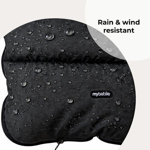 Black mybabiie universal footmuff with water-resistant fabric cover for stroller protection