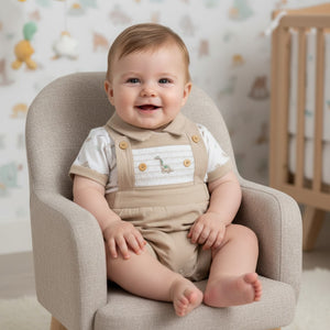 Beige baby boys dinosaur embroidered dungaree with white patch and wooden buttons in a top set