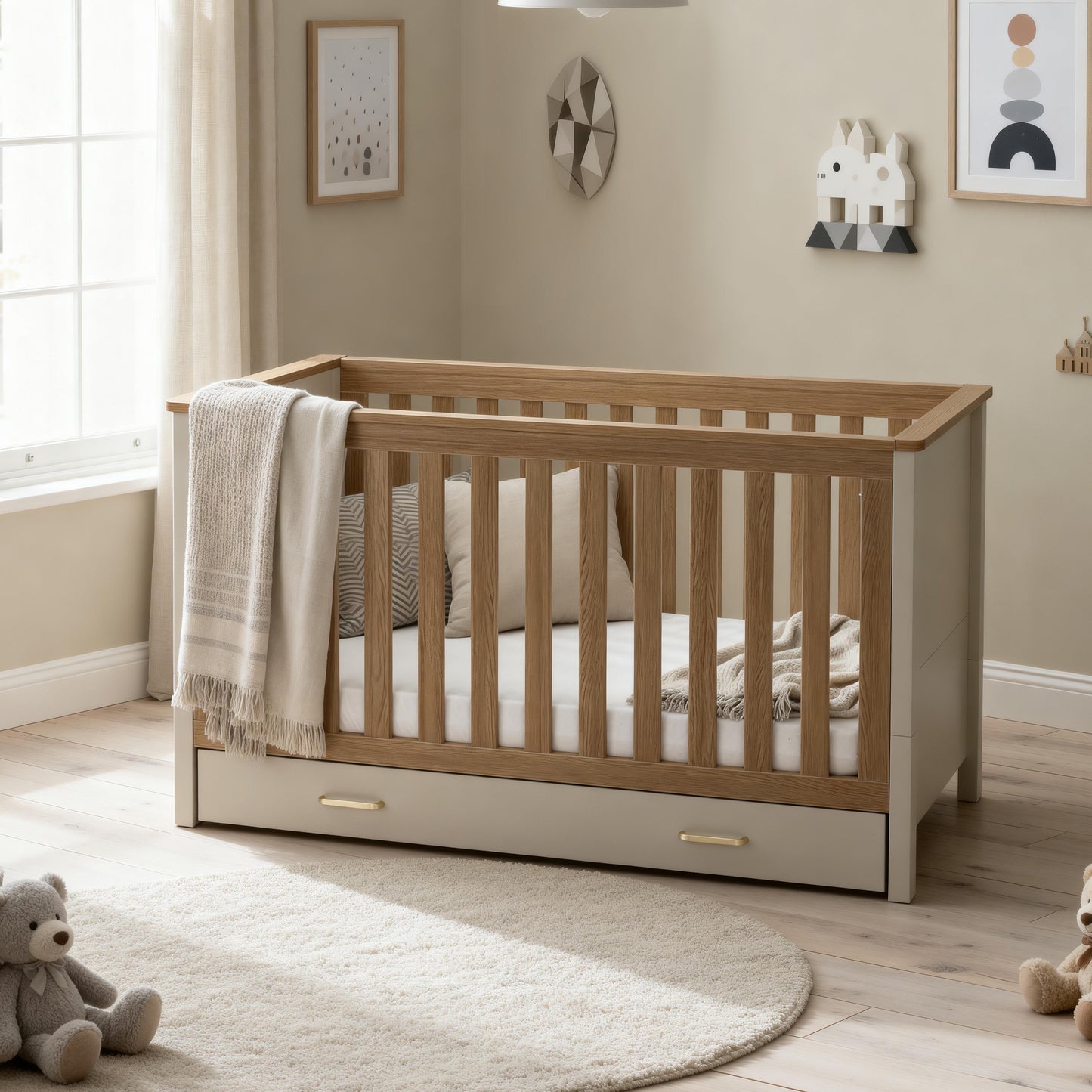 Babymore Mira cot bed in cashmere warm oak with modern wooden light oak slats and beige base with storage drawers
